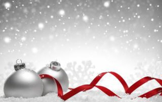 Christmas silver background with balls and ribbons